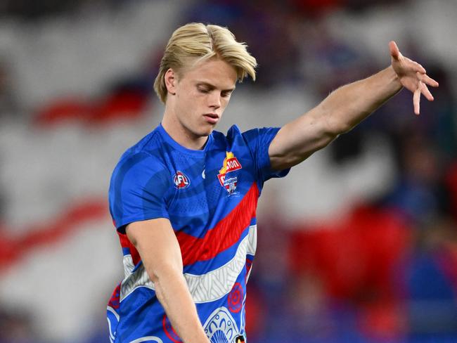 MELBOURNE, AUSTRALIA - APRIL 20: Sam Davidson of the Bulldogs warms up during the round six AFL match between Western Bulldogs and St Kilda Saints at Marvel Stadium, on April 20, 2025, in Melbourne, Australia. (Photo by Quinn Rooney/Getty Images)