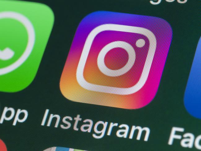 London, UK - July 30, 2018: The buttons of the photo app Instagram, surrounded by WhatsApp, Facebook, Messages and other apps on the screen of an iPhone. Picture: iStock