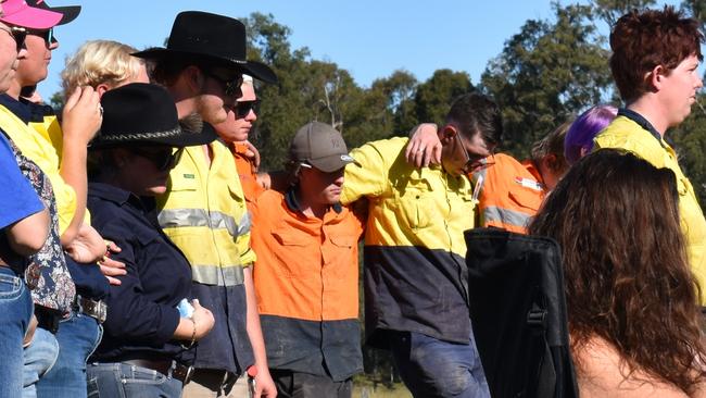 Mourners supported each other during the heartfelt service, where beloved Glenwood man Cody Bergemann was farewelled. Photo: Elizabeth Neil