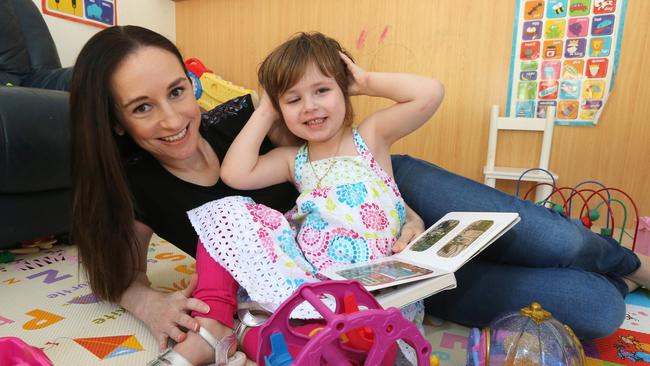 Gold Coast Community Fund assisted three-year-old Audrey Snow who has both autism and cancer pictured with her mother Claudine Snow at their Arundel home. Picture: Mike Batterham