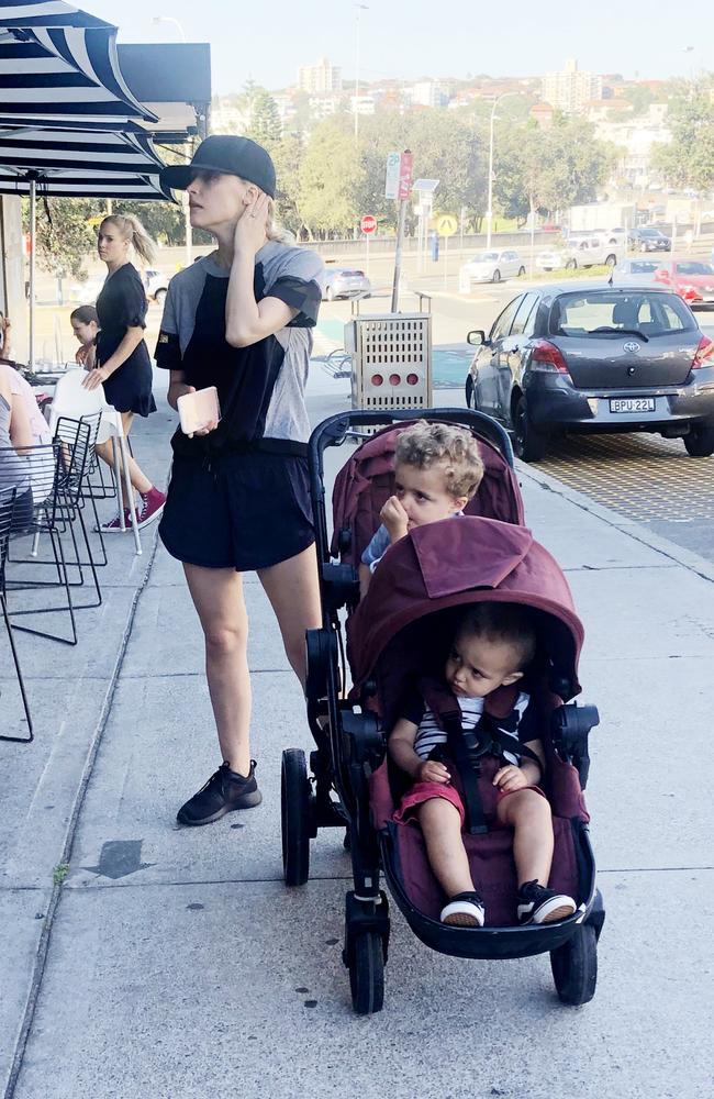 A make-up-free Rose Byrne with sons Rocco and Rafa at Harry's cafe in Bondi on Monday morning. Picture: Lydia Pedrana