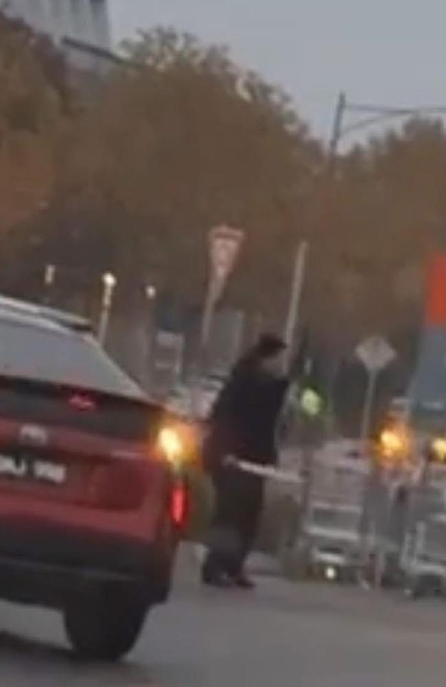 One of the teens armed with a machete. Picture: Supplied