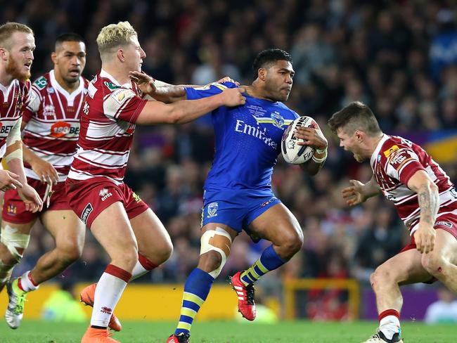 Chris Sandow of Warrington is tackled.