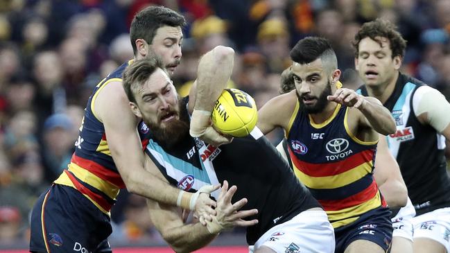 The easing of training restrictions in South Australia could see the Crows and Power do battle at home in Round 2. Picture: Sarah Reed