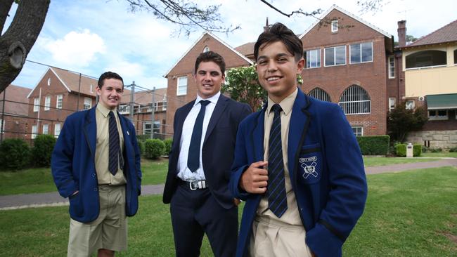 James Widders-Leece, centre, with students Matthew Stewart, 17, left, and Kyh Samuelsson, 15, at Knox Grammar. Picture: Britta Campion