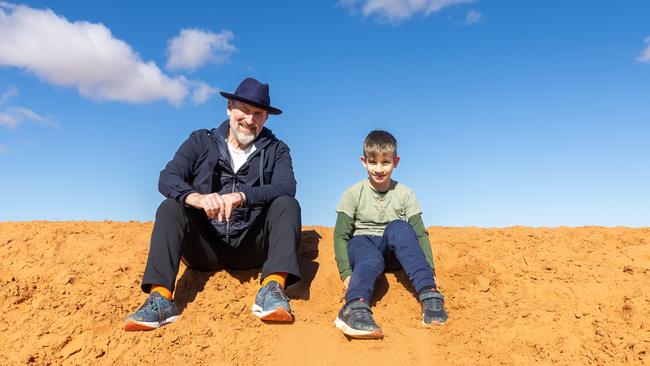 Colin Hay on Big Red with eight-year-old festivalgoer Leon. Picture: Matt Williams