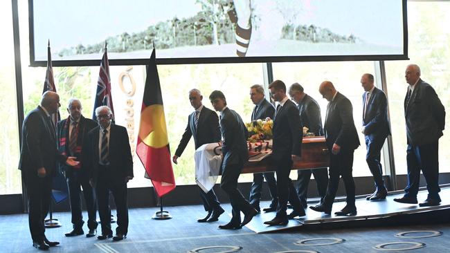 Pallbearers carry Neil Kerley’s coffin during his state funeral. Picture: Keryn Stevens