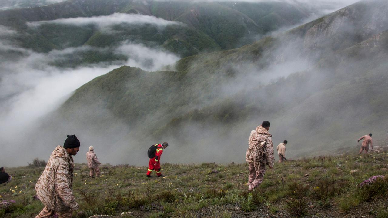 The chopper went down in a fog-shrouded mountain region. Picture: Azin Haghighi/MOJ News Agency/AFP