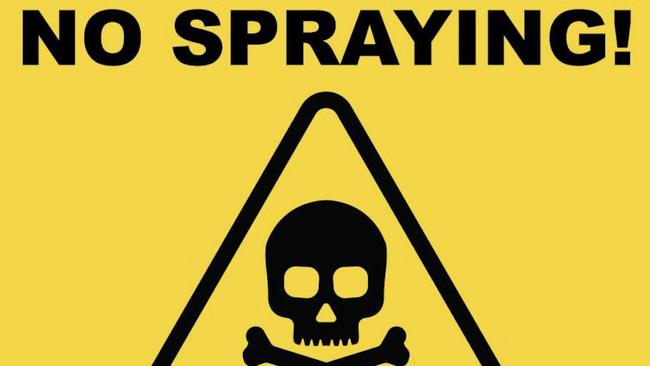 Signs warning residents about fire ant spraying on conspiracy group, Aussie Flyers.