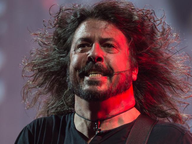 Dave Grohl of The Foo Fighters performs on the Pyramid Stage during the Glastonbury Festival of Music and Performing Arts on Worthy Farm near the village of Pilton in Somerset, southwest England, on June 24, 2017.  / AFP PHOTO / Oli SCARFF