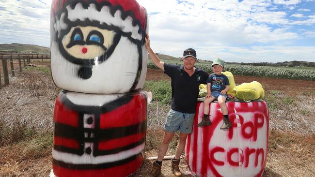 Red Rock Hay Bale Trail, Clinton Theodore &amp; his son Rhett, 3, Alvie. Picture: Yuri Kouzmin