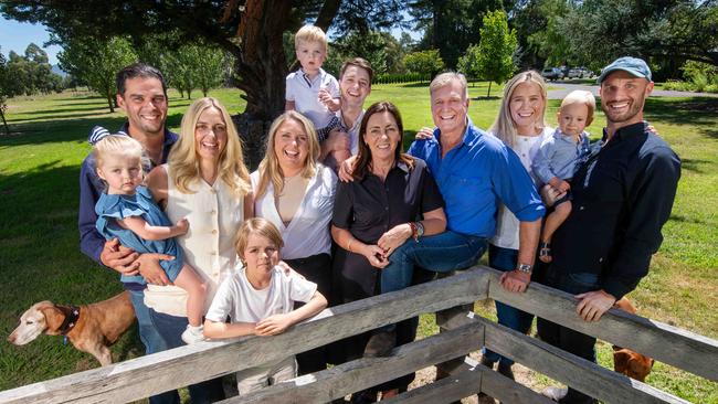 Tim and Jenee Roberts-Thomson with children (left to right) Georgia and her husband, Henry Sayers, James and his wife, Zanny, Madeleine and her husband, Matt Skerrett, and grandchildren Poppy, Ted, Harry and Charlie on TRT Pastoral’s property at Delatite near Mansfield. Picture: Rob Leeson