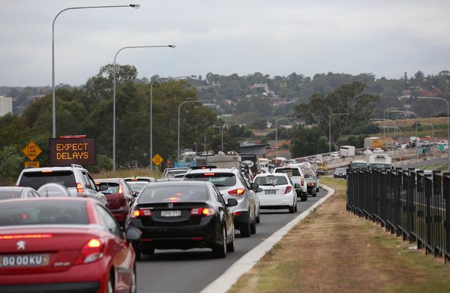 Bumper-to-bumper traffic on Narellan Rd in 2017, with the 6.8km recently completed.