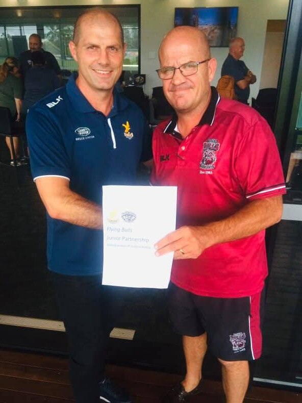 Officials from the Gold Coast Eagles and Nerang Bulls have signed a memorandum of understanding to combine junior clubs. Picture: Gold Coast Eagles / Facebook