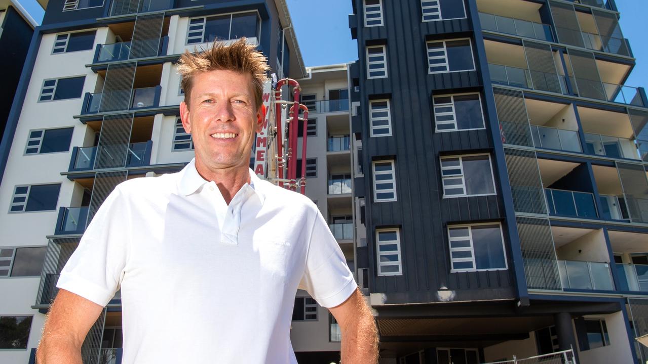 Scott Juniper standing outside the Beach Life high-rise at Alexandra Headland.