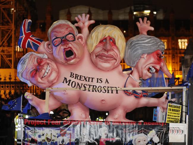 An anti-Brexit effigy is driven around Parliament square after the results of the vote were announced. Picture: AP Photo/Frank Augstein