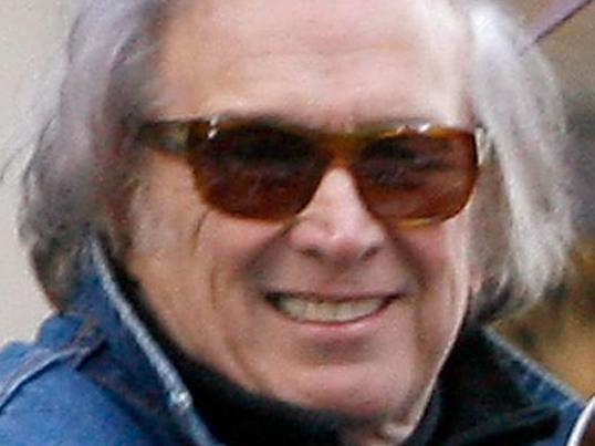 (FILES) In this November 22, 2012 file photo, musician Don McLean attends the 86th Annual Macy's Thanksgiving Day Parade in New York City. The original manuscript of Don McLean's enigmatic song "American Pie" sold at auction in New York on April 7, 2015 for $1.2 million, Christie's said. The 18 pages of manuscript, written in pencil, ink and typescript, had been expected to fetch between $1 and $1.5 million at the auction house. McLean said he wanted to release the manuscript to help people understand the true meaning of the song, released in 1971 and which depicts turbulent upheavals of the latter half of the 20th century. AFP PHOTO / FILES /Mike Lawrie/Getty Images == FOR NEWSPAPERS, INTERNET, TELCOS & TELEVISION USE ONLY ==