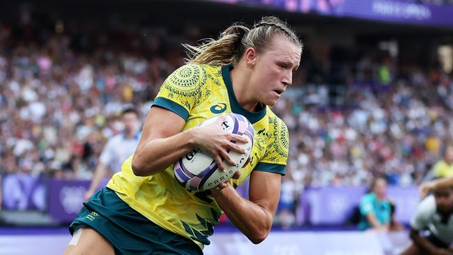 Maddison Levi of Team Australia scores one of her 14 tries across the Olympics. Picture: Cameron Spencer/Getty Images.