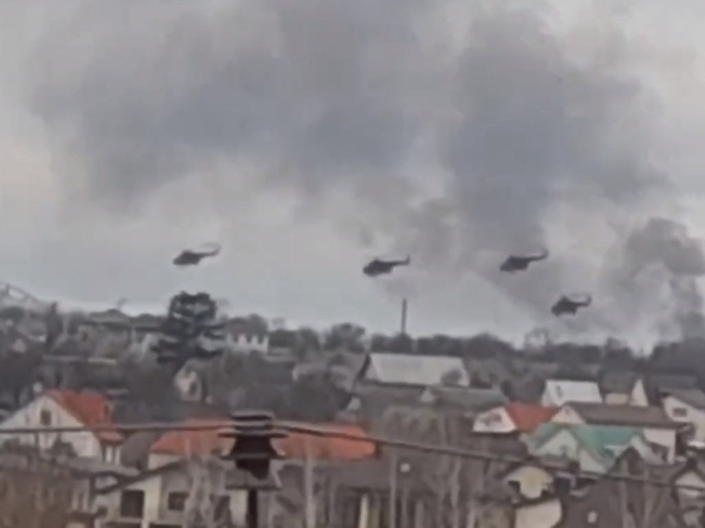 Russian helicopters in attack formation attacking Gostomel Airport, northwest of Ukraine’s capital. Picture: Supplied.