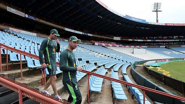 Australian batsmen Alex Doolan, left, and Phillip Hughes check out the surrounds at Centurion before a batting session. Pictu...