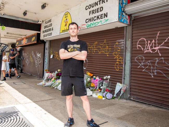 \Ben Keans has come to show community support at Buzzy Bee Burger House following Saturday’s double murder. Picture Thomas Lisson