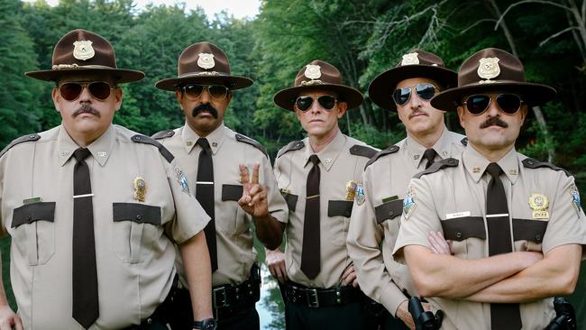 (From L-R): Kevin Heffernan as "Farva," Jay Chandrasekhar as "Thorny," Erik Stolhanske as "Rabbit," Paul Soter as "Foster," and Steve Lemme as "Mac" in the film SUPER TROOPERS 2. Photo by Jon Pack. © 2018 Twentieth Century Fox Film Corporation All Rights Reserved