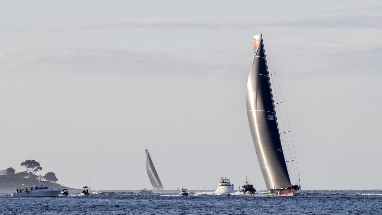 Andoo Comanche leads over eventual race winner LawConnect near South Arm during the 2023 Rolex Sydney Hobart yacht race. Picture: Chris Kidd