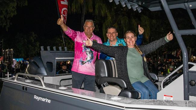 Boyne Tannum Hookup major prize winner Emma Marek with Hookup vice-president Andrew Davis and Gladstone Mayor Matt Burnett. Emma won a Sea Jay 630 Vision with 200hp Yamaha outboard and Raymarine electronics installed by Modern Marine Electronics Gladstone.