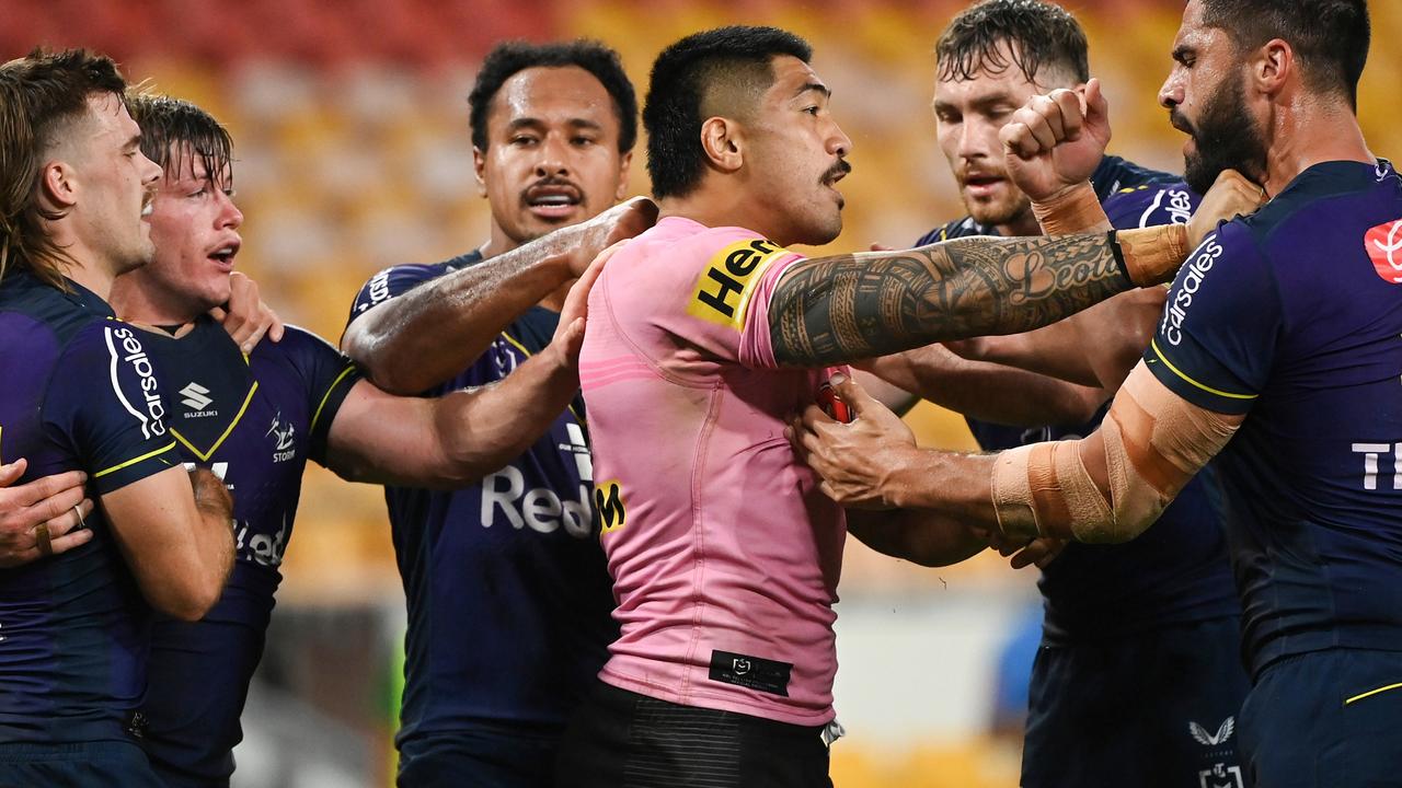 Moses Leota of the Panthers clashes with Jesse Bromwich of the Storm.