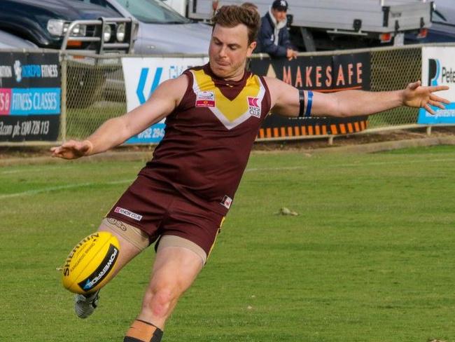 Jess Bolton gets a kick away for Boronia in the EFL. Picture: David Nicholas