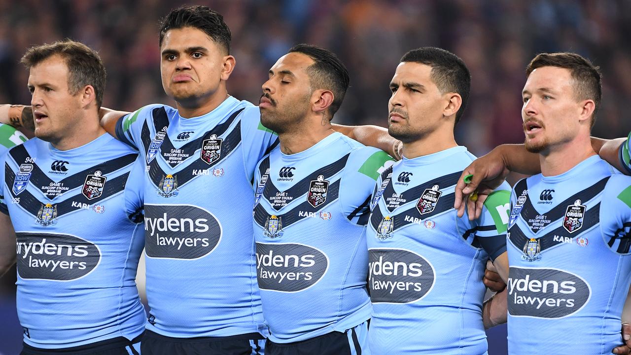 Josh Morris, Latrell Mitchell, Josh Addo-Carr, Cody Walker and Damien Cook arm in arm during the singing of the national anthem in State of Origin. Picture: AAP Image/Dave Hunt