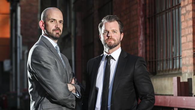 Detective Brevet Sergeant Stephen Hegarty and Federal Agent Jonathon Coats. Picture: Sarah Reed