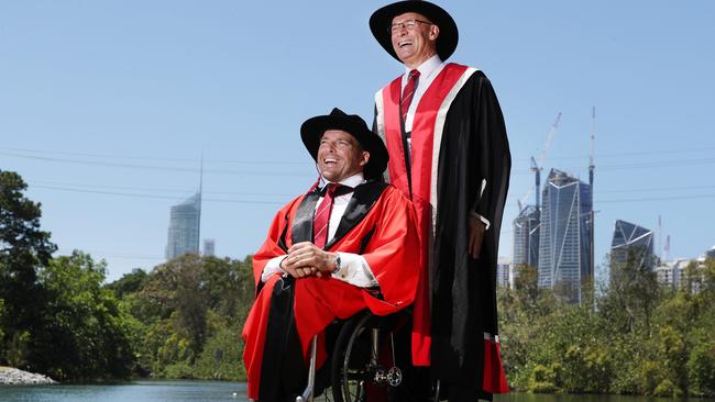 Professor Martin Betts with Paralympic athlete Kurt Fearnley, as the latter was awarded an honorary doctorate by Griffith University in 2018.