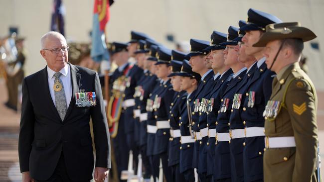 Governor General David Hurley inspects the troops after being accorded a General Salute in the Forecourt of Parliament House last year in Canberra.