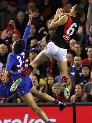 Joe Daniher takes a big mark over Lewis Young. Picture: Michael Klein