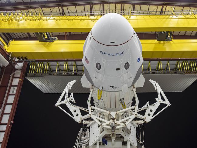 (FILES) In this file photo taken on May 20, 2020 released by Space X, the Crew Dragon spacecraft and the SpaceX Falcon 9 rocket are pictured at Launch Complex 39A on May 21, 2020, as preparations continue for the Demo-2 mission at NASA's Kennedy Space Center in Florida. - SpaceX's aim, when it was incorporated on March 14, 2002, was to make low-cost rockets to travel one day to Mars -- and beyond. The 11th employee hired that year turned out to be someone good: Gwynne Shotwell, who was in charge of business development, soon established herself as Musk's right-hand woman. In the space industry, the two are given the rock star privilege of only being referred to by their first names. (Photo by - / SPACEX / AFP) / RESTRICTED TO EDITORIAL USE - MANDATORY CREDIT "AFP PHOTO / SPACE X " - NO MARKETING - NO ADVERTISING CAMPAIGNS - DISTRIBUTED AS A SERVICE TO CLIENTS / TO GO WITH AFP STORY BY Ivan COURONNE: "Rocketman (and woman): Elon and Gwynne, the pair who made SpaceX"