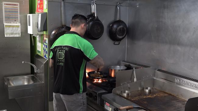 A prisoner prefers food at the Macquarie prison Grills and Gates cafe.