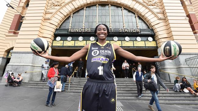 Basketball rising star Ezi Magbegor in Melbourne Boomers kit shows her span in central Melbourne. Picture: Lawrence Pinder