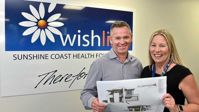 Wishlist CEO Lisa Rowe and Ausmar Homes business unit manager Josh Green. Picture: Patrick Woods