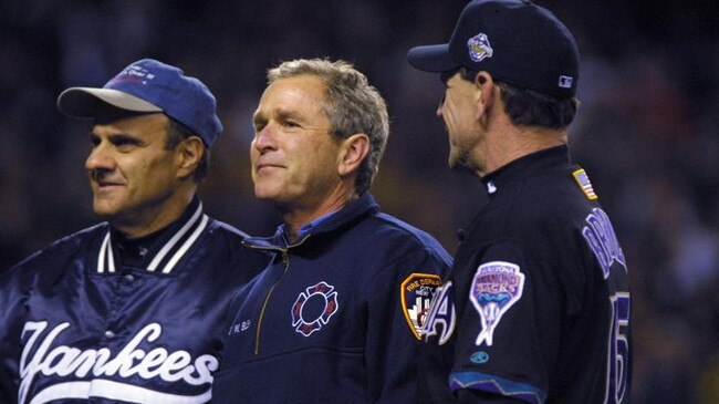 President George W. Bush talks with Yankess manager Joe Torre and Bob Brenly the Arizona Diamondbacks during the 2001 World Series Picture: Allsport