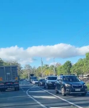 Cars taking service road