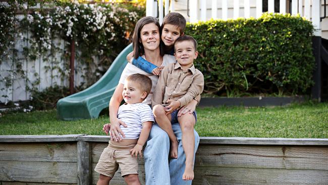 Jane Hogbin with her three boys (LR) Joey (3), Isaac (7), Max (5) at their home in Charlestown. Jane is the widow of Dr Dave Hogbin who was attacked by a crocodile in far north Queensland. Picture: Adam Yip