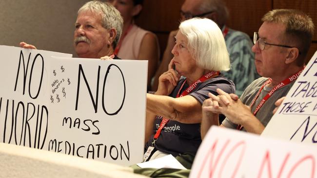 Anti-fluoride protesters at a Cairns Regional Council meeting. Picture: Brendan Radke