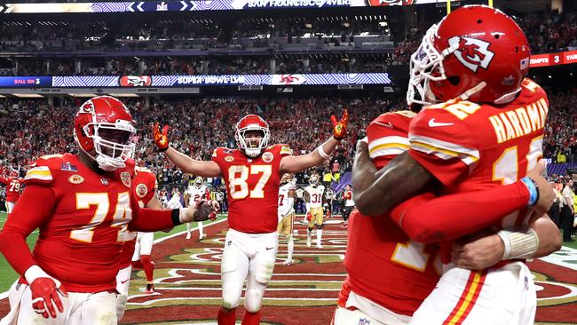 Mecole Hardman Jr of the Kansas City Chiefs celebrates with Patrick Mahomes #15 and teammates after catching the game-winning touchdown pass to defeat the San Francisco 49ers Picture: Getty Images