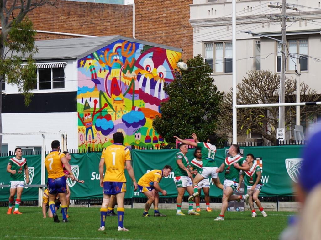 Mark Daoud kicks the winning field goal for the Coogee Dolphins. Picture: Angelique Klimis