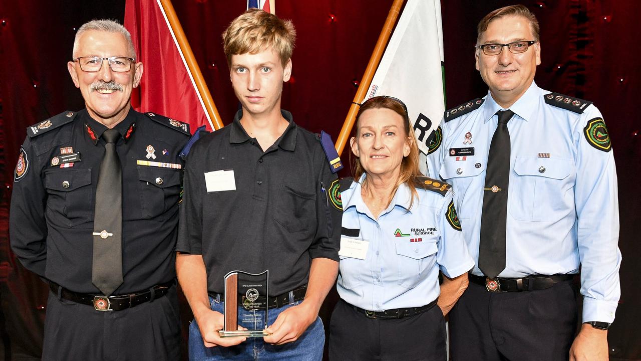 Assistant Commissioner Steve Barber, Young volunteer of the year Time Foster, Judy Ferrari and director for rural fire service in Gladstone, Craig Magick at the QFES volunteer conference.