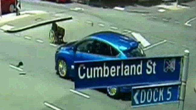 A blue Ford hatch was found abandoned on Latrobe St near King St after the incident. Picture: Channel 7