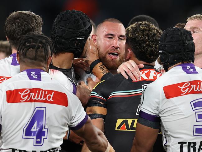 SYDNEY, AUSTRALIA - SEPTEMBER 22:  Nelson Asofa-Solomona of the Storm scuffles with Panthers players during the NRL Preliminary Final match between the Penrith Panthers and Melbourne Storm at Accor Stadium on September 22, 2023 in Sydney, Australia. (Photo by Brendon Thorne/Getty Images)