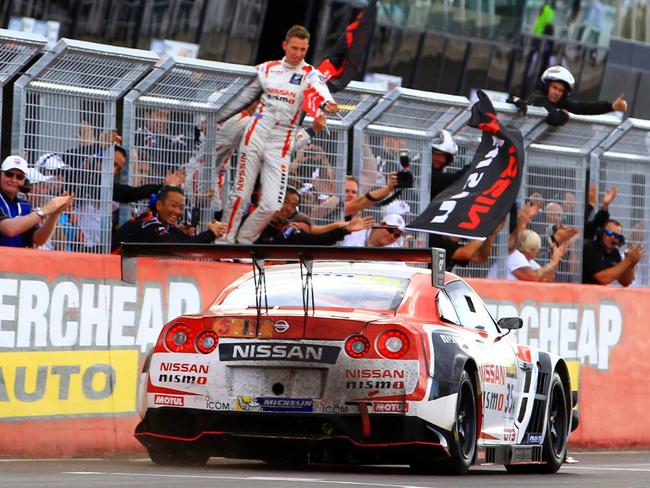 Florian Strauss congratulating his teammate after winning the Bathurst 12 Hour.