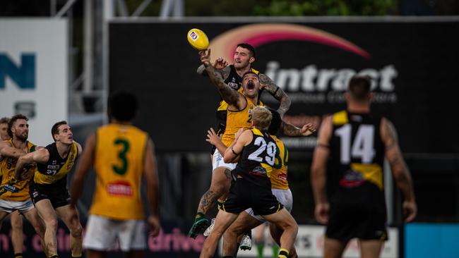 Liam Buxton and Mitch Musgrove in the 2023-24 NTFL Men's Grand Final between Nightcliff and St Mary's. Picture: Pema Tamang Pakhrin